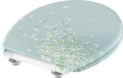 SCHÜTTE WC-Bril 82381 FLOWER IN THE WIND - Duroplast - Soft Close - Afklikbaar - RVS-Scharnieren - Decor - 3-zijdige Print -Badkamer Accessoires Winkel 1200x762 2
