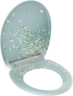 SCHÜTTE WC-Bril 82381 FLOWER IN THE WIND - Duroplast - Soft Close - Afklikbaar - RVS-Scharnieren - Decor - 3-zijdige Print -Badkamer Accessoires Winkel 919x1200 1